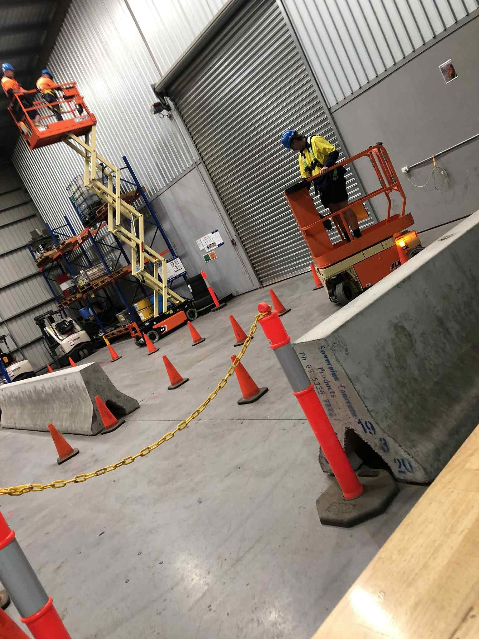 Helping out the boys on a electrical worksite in a warehouse