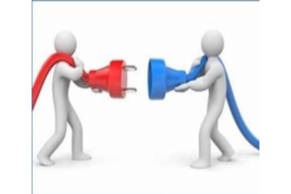 Two stick figures plug red and blue connectors together against a white background