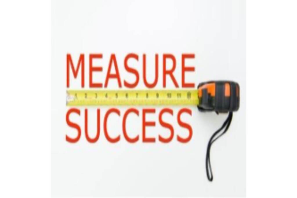 “MEASURE SUCCESS” text with a yellow tape measure on a white background