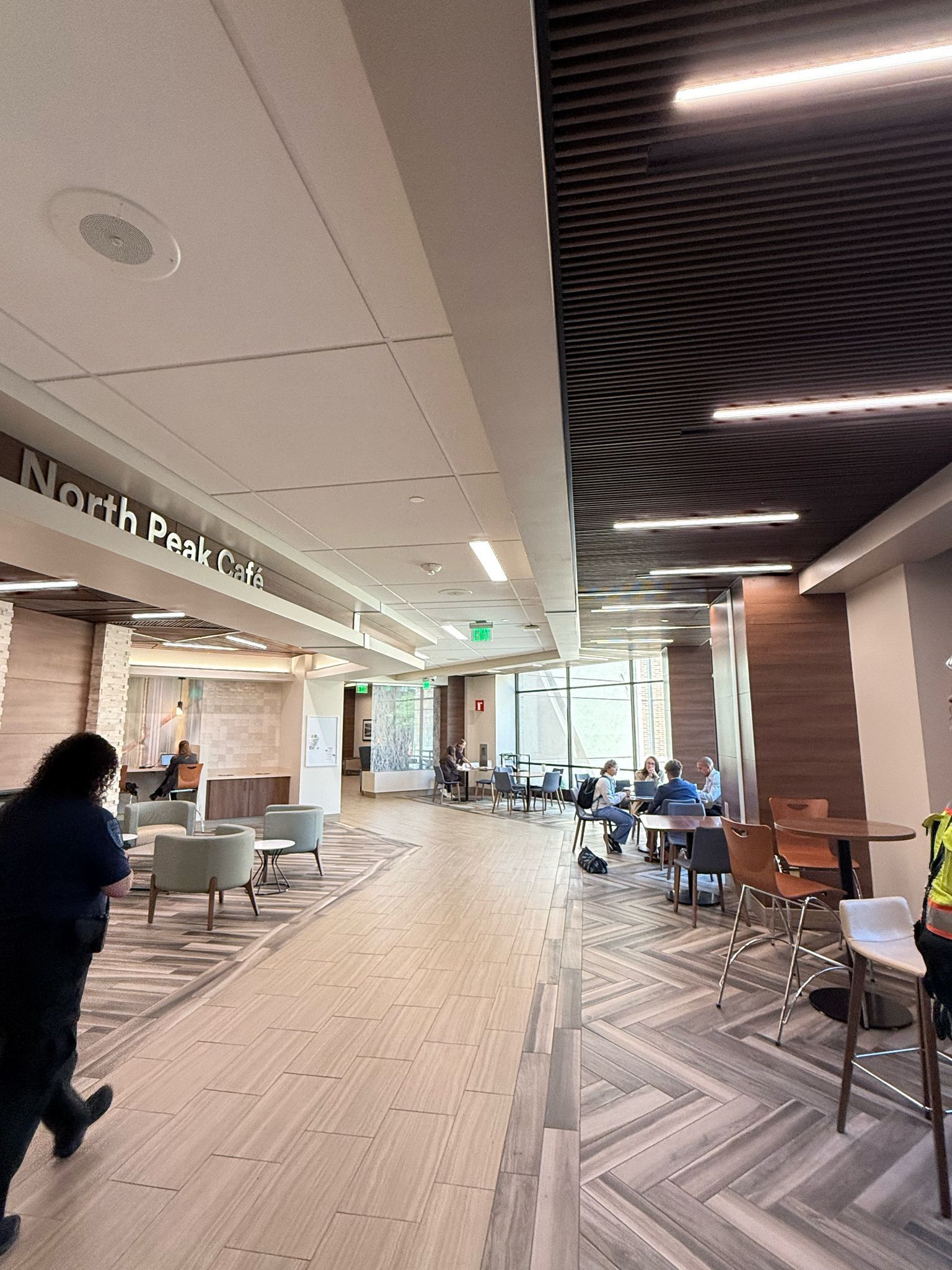Interior hallway with seating areas, 