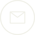 White envelope icon in a white circle.