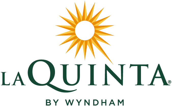 La Quinta by Wyndham logo: Sunburst graphic above dark green text.