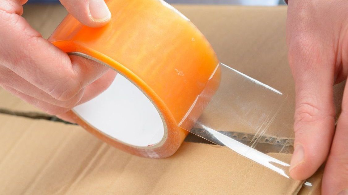 packing tape on moving box