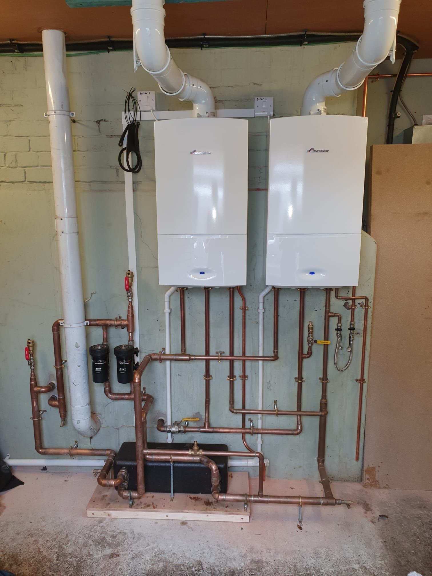 Photo of two installed Worcester Bosch boilers
