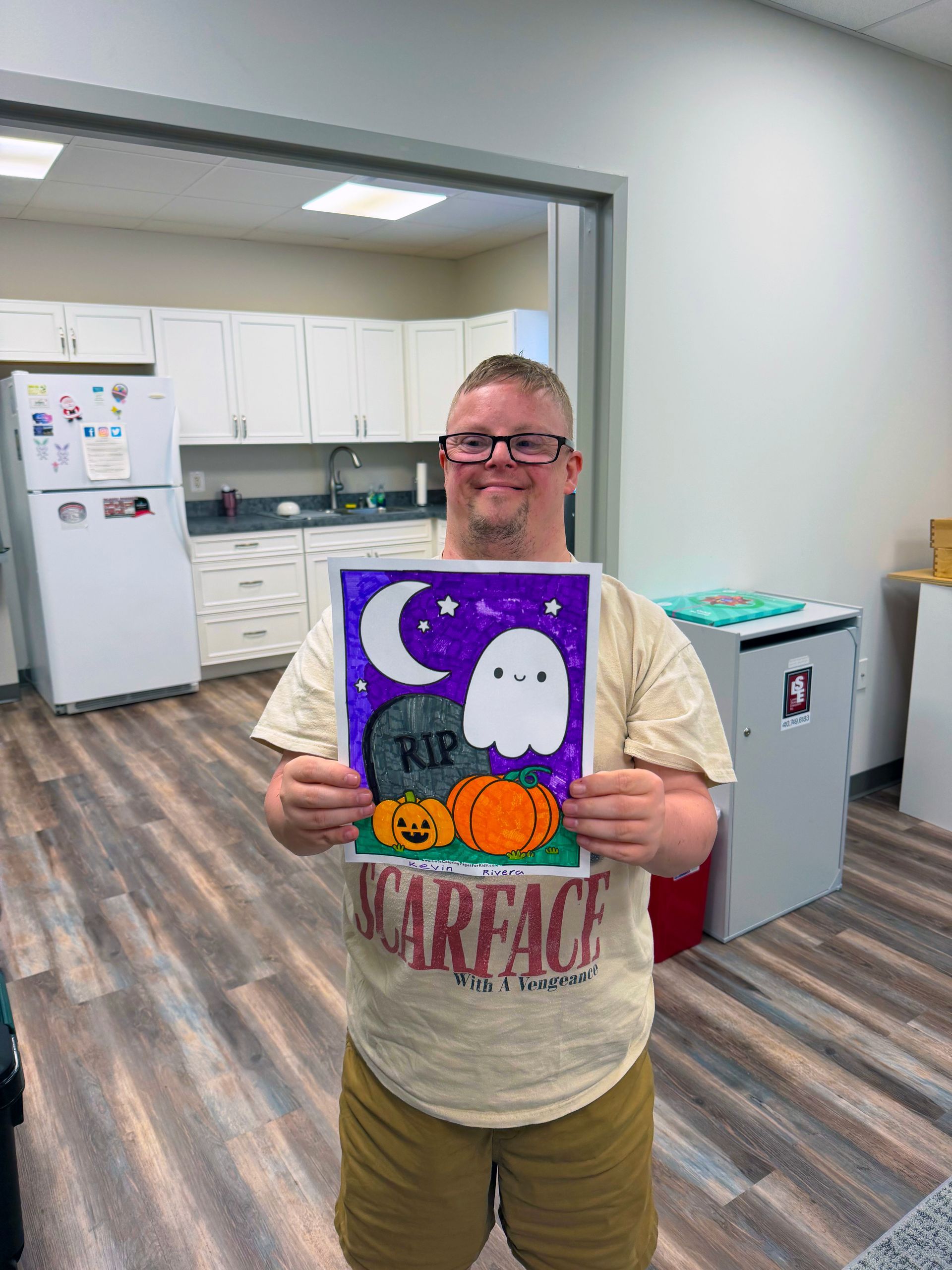 Kevin showing off his Spooky Creation at Coloring Club (2026)
