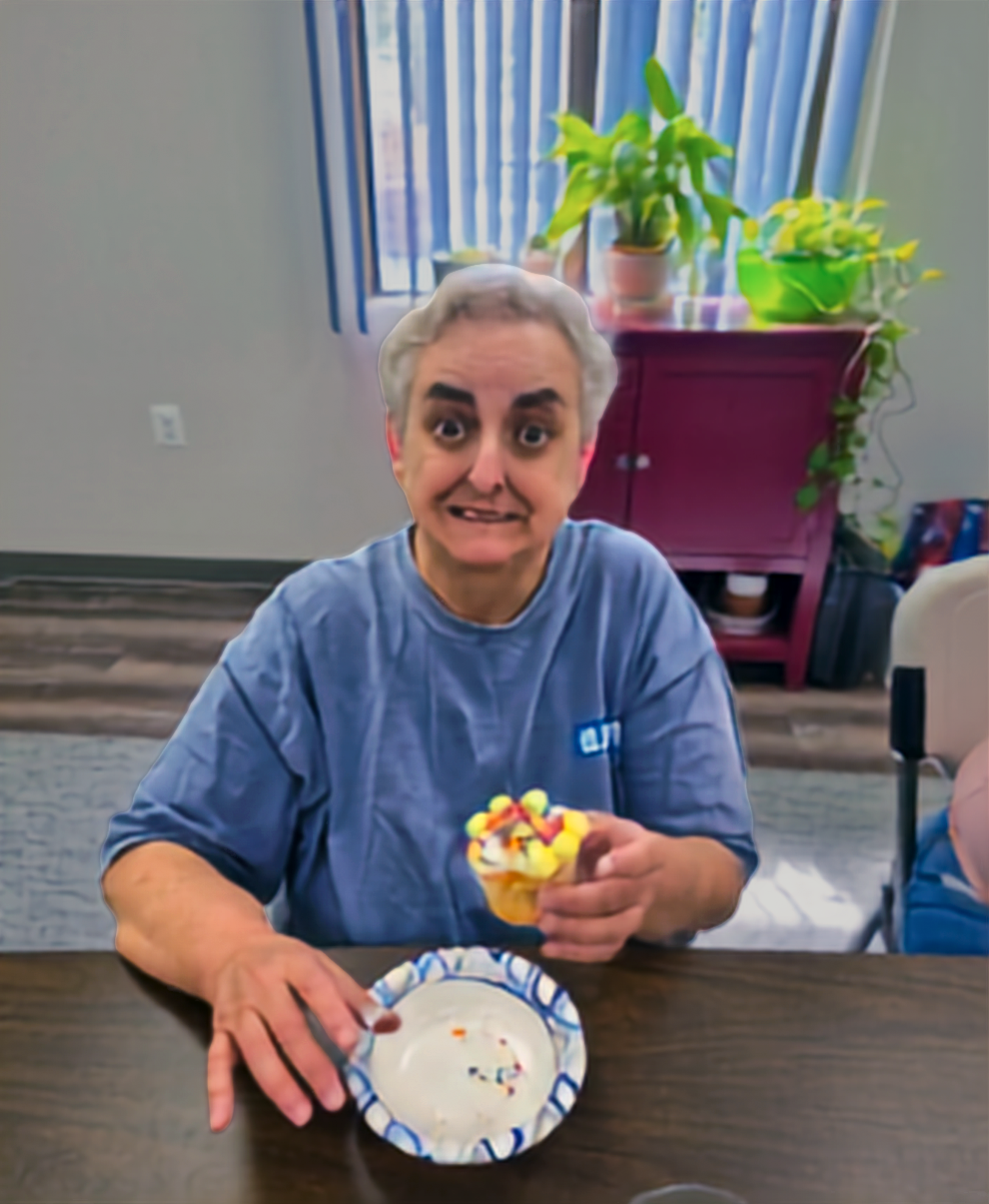 Sandra showing off her completely decorated cupcake (2026)