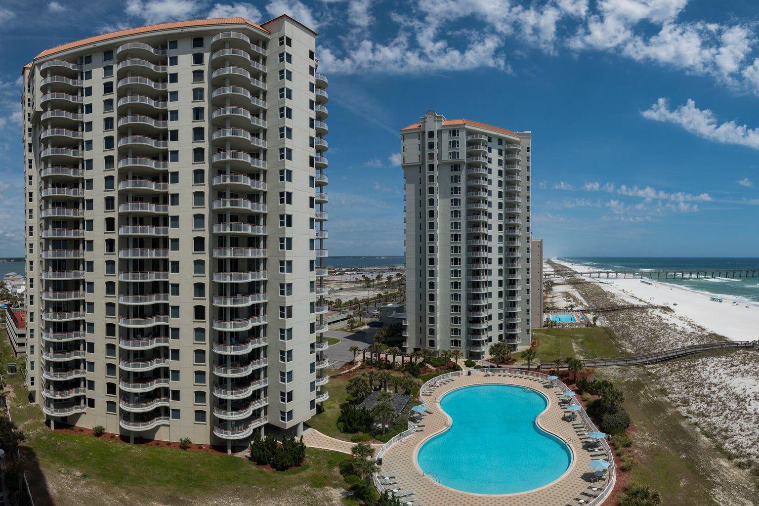 Exterior high rise with pool