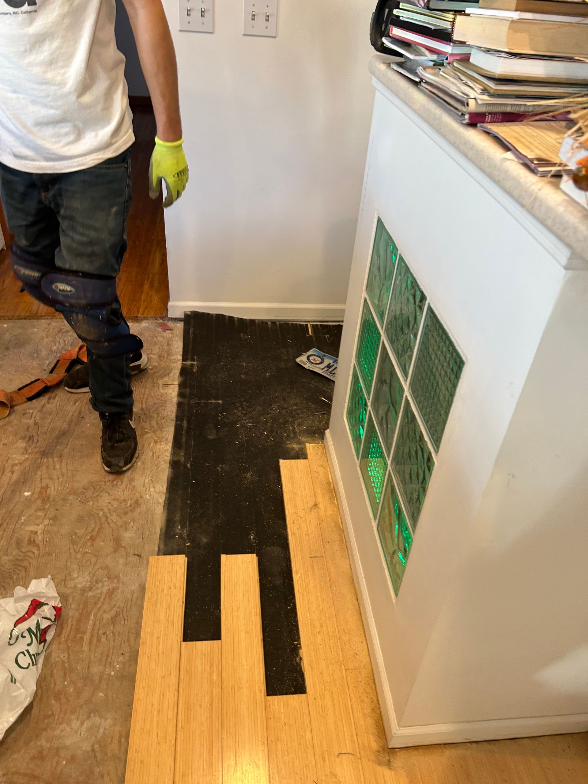 Person installing hardwood 