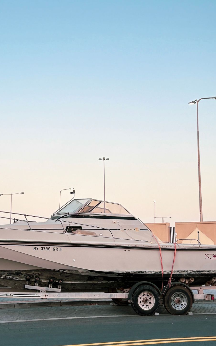 small boat parked on a trailer