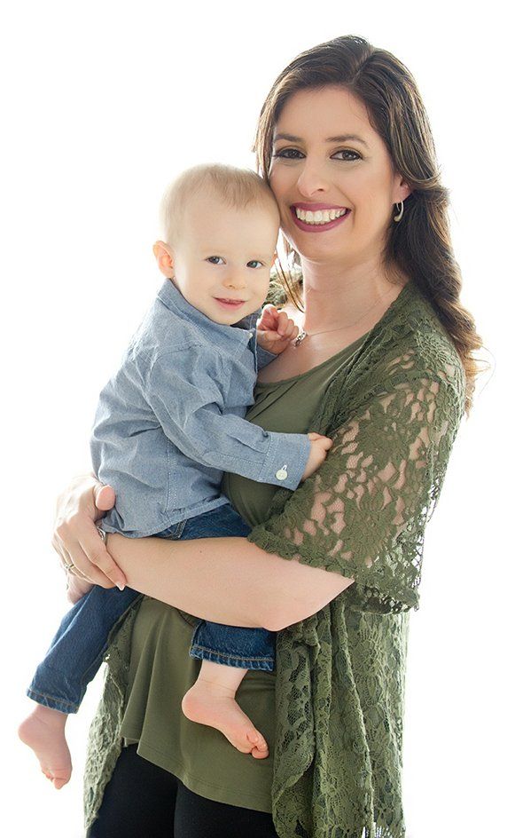 Mother Holding Her Child — Apollo Beach, FL — Tampa Bay Contracting Co, LLC