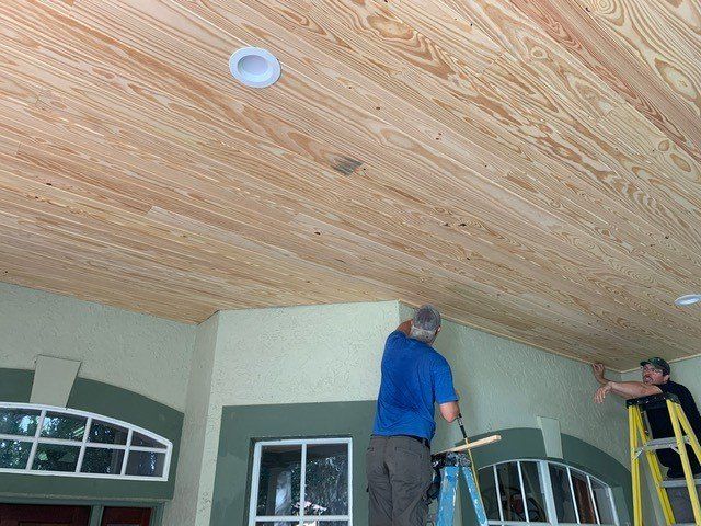 Workers Holding Renovation Plan — Apollo Beach, FL — Tampa Bay Contracting Co, LLC
