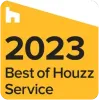 A yellow sign that says best of houzz service