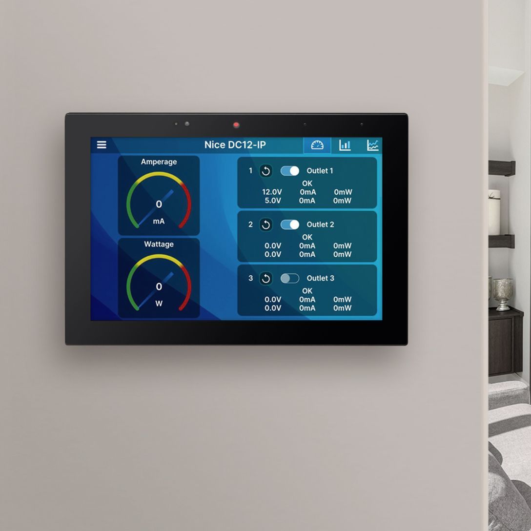 Wall-mounted touchscreen showing blue control dashboard with gauges and data panels