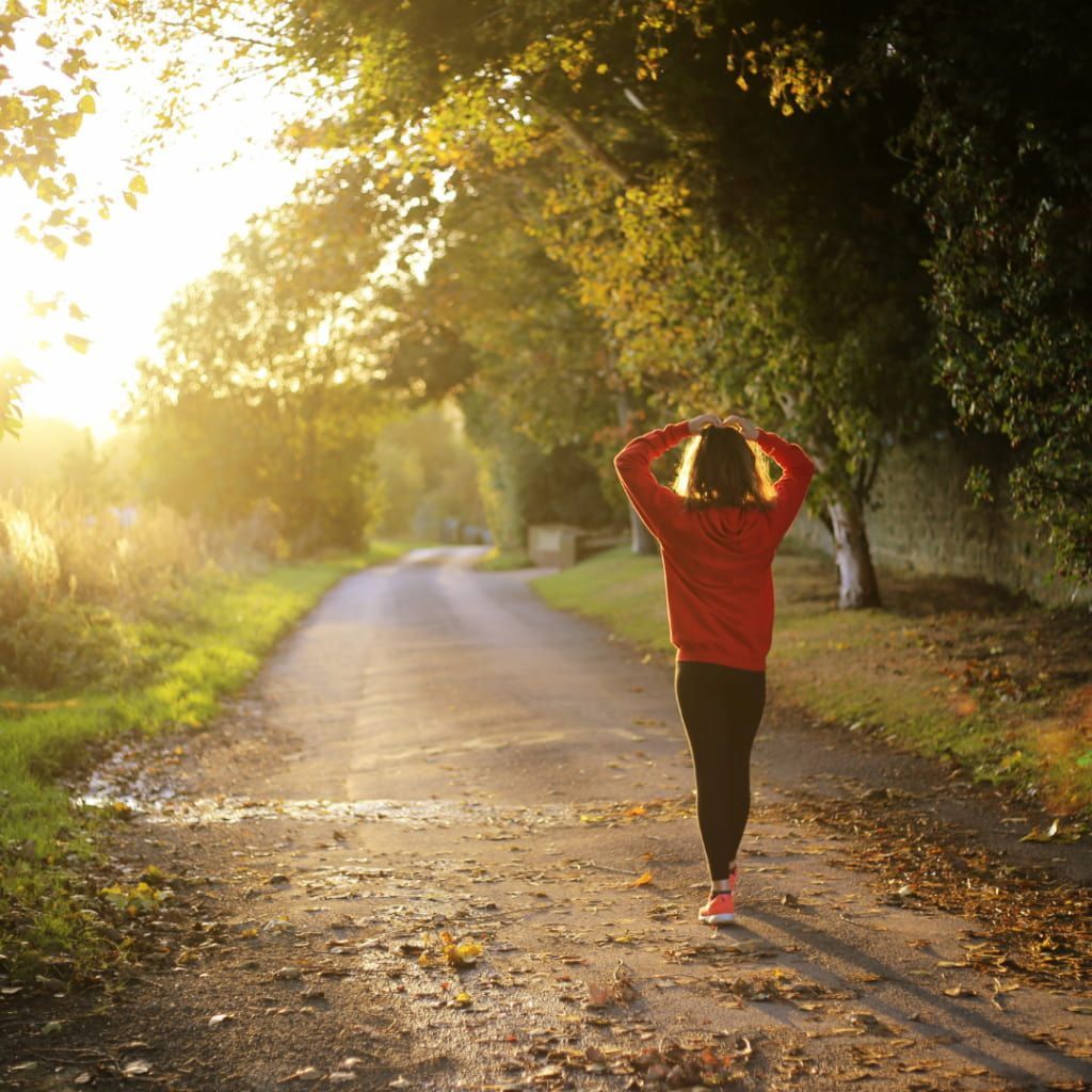 A Person in a Red Hoodie and Black Leggings โ Michelle Crutcher Business Coaching & Consulting in The Entrance North, NSW