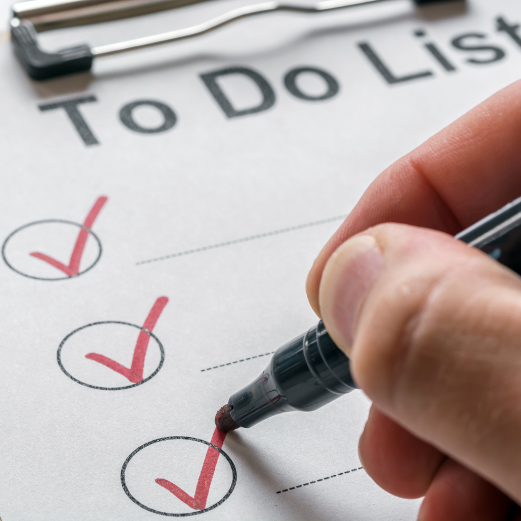 A Hand Uses a Marker to Check — Michelle Crutcher Business Coaching & Consulting in The Entrance North, NSW