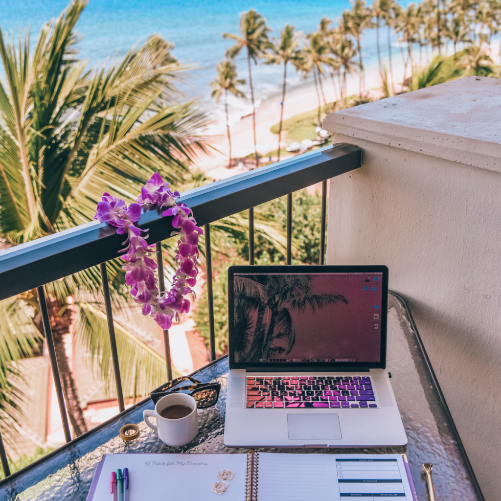 Laptop, Notebook, and Coffee on a Balcony — Michelle Crutcher Business Coaching & Consulting in The Entrance North, NSW