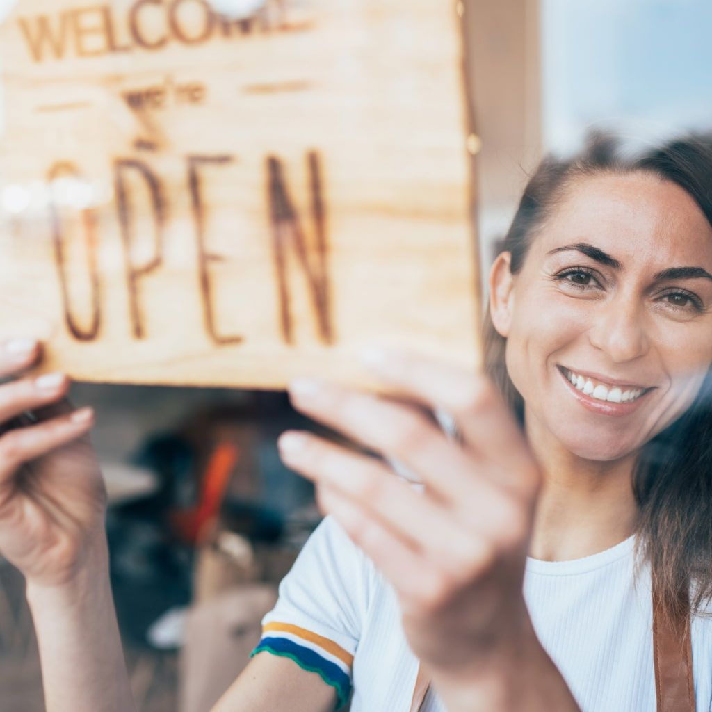 A Smiling Person in a White T-shirt — Michelle Crutcher Business Coaching & Consulting in The Entrance North, NSW