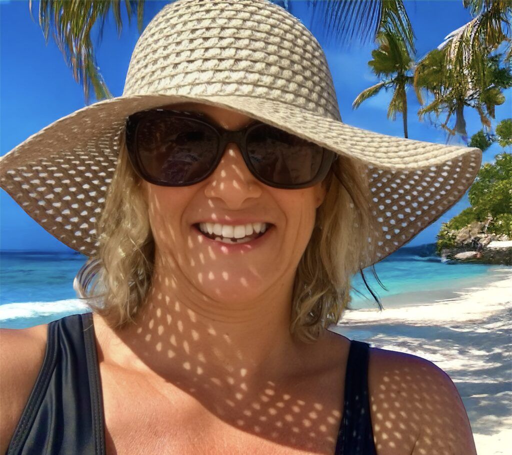 A Woman Smiles at the Beach — Michelle Crutcher Business Coaching & Consulting in The Entrance North, NSW