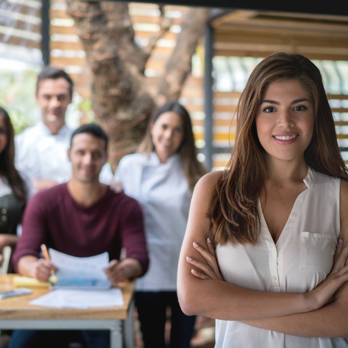 Woman Stands Confidently In Front Of A Setting — Michelle Crutcher Business Coaching & Consulting in The Entrance North, NSW
