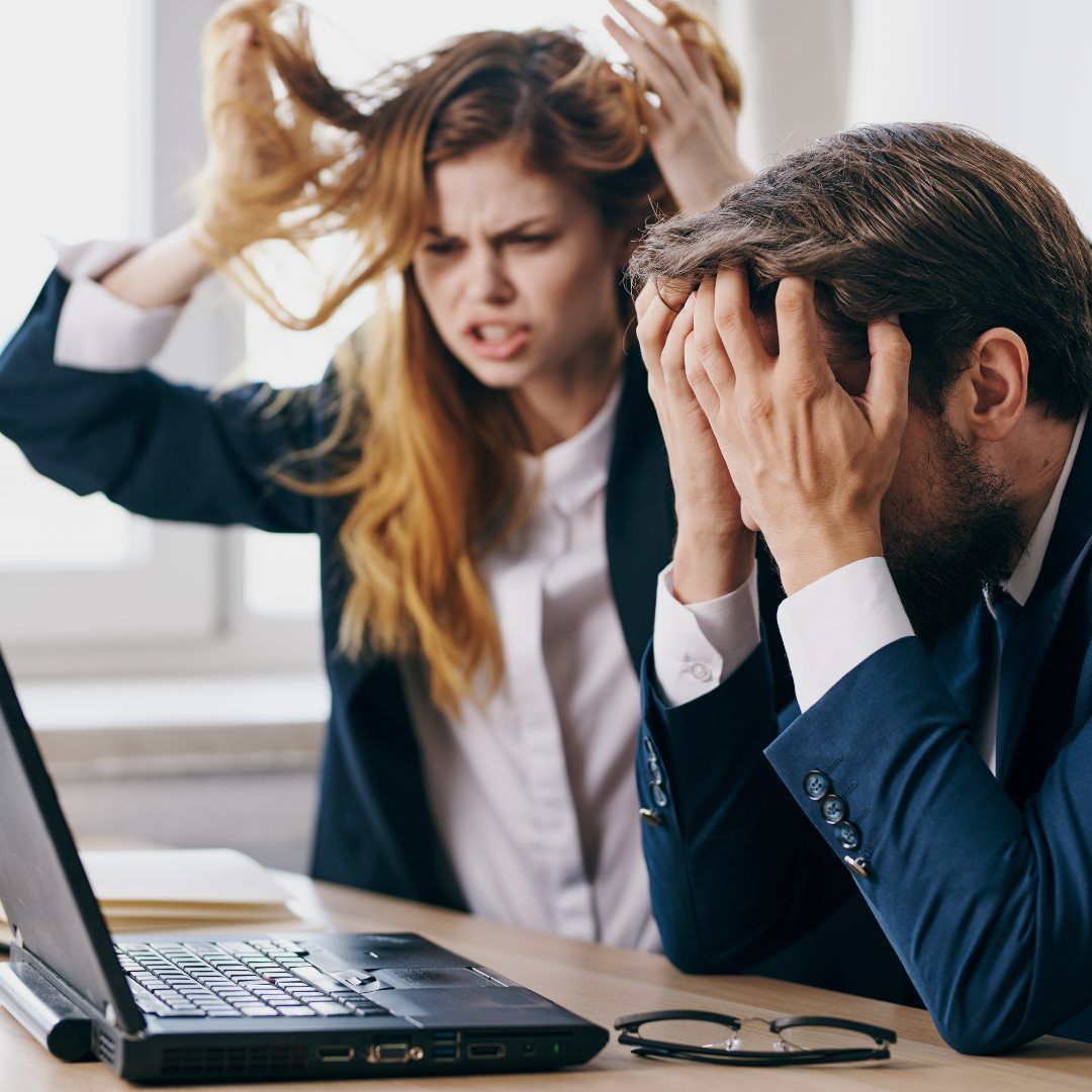 Two Professionals in Office Look Stressed — Michelle Crutcher Business Coaching & Consulting in The Entrance North, NSW