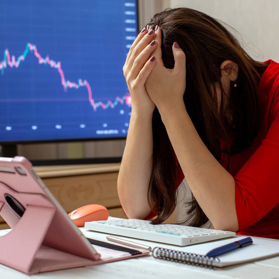 A Person Holds Their Head In Frustration — Michelle Crutcher Business Coaching & Consulting in The Entrance North, NSW