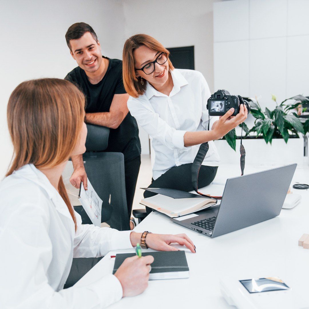 Three People Collaborate in a Bright Office — Michelle Crutcher Business Coaching & Consulting in The Entrance North, NSW