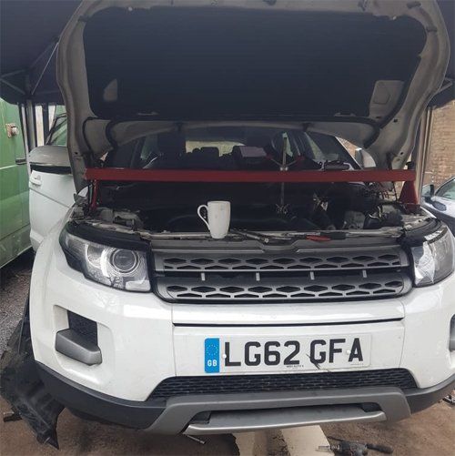 Picture of a range rover with its bonnet open