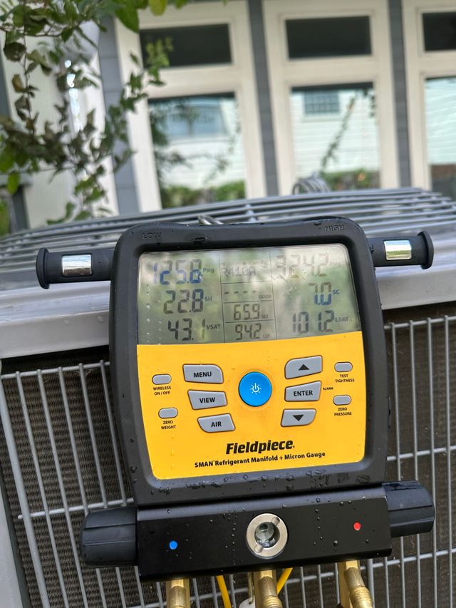 AC Repair checking the refrigerant charge after doing maintenance