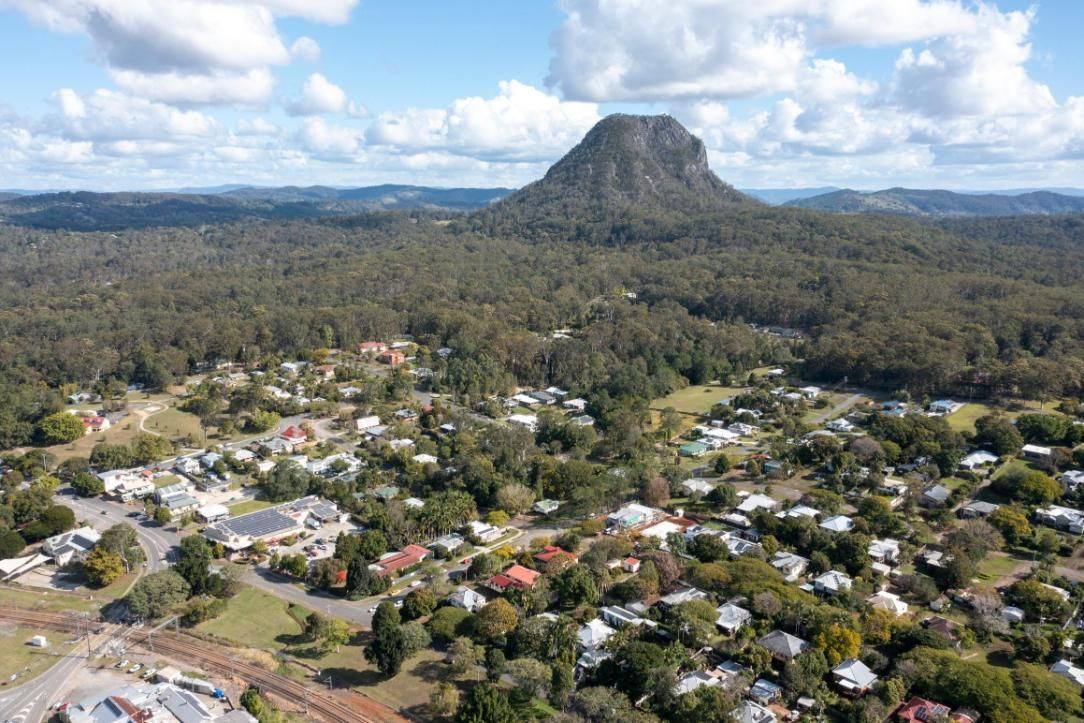 An Aerial View Of A Residential Area With A Mountain In The Background — Gympie Septic Pump Outs In Pomona, QLD