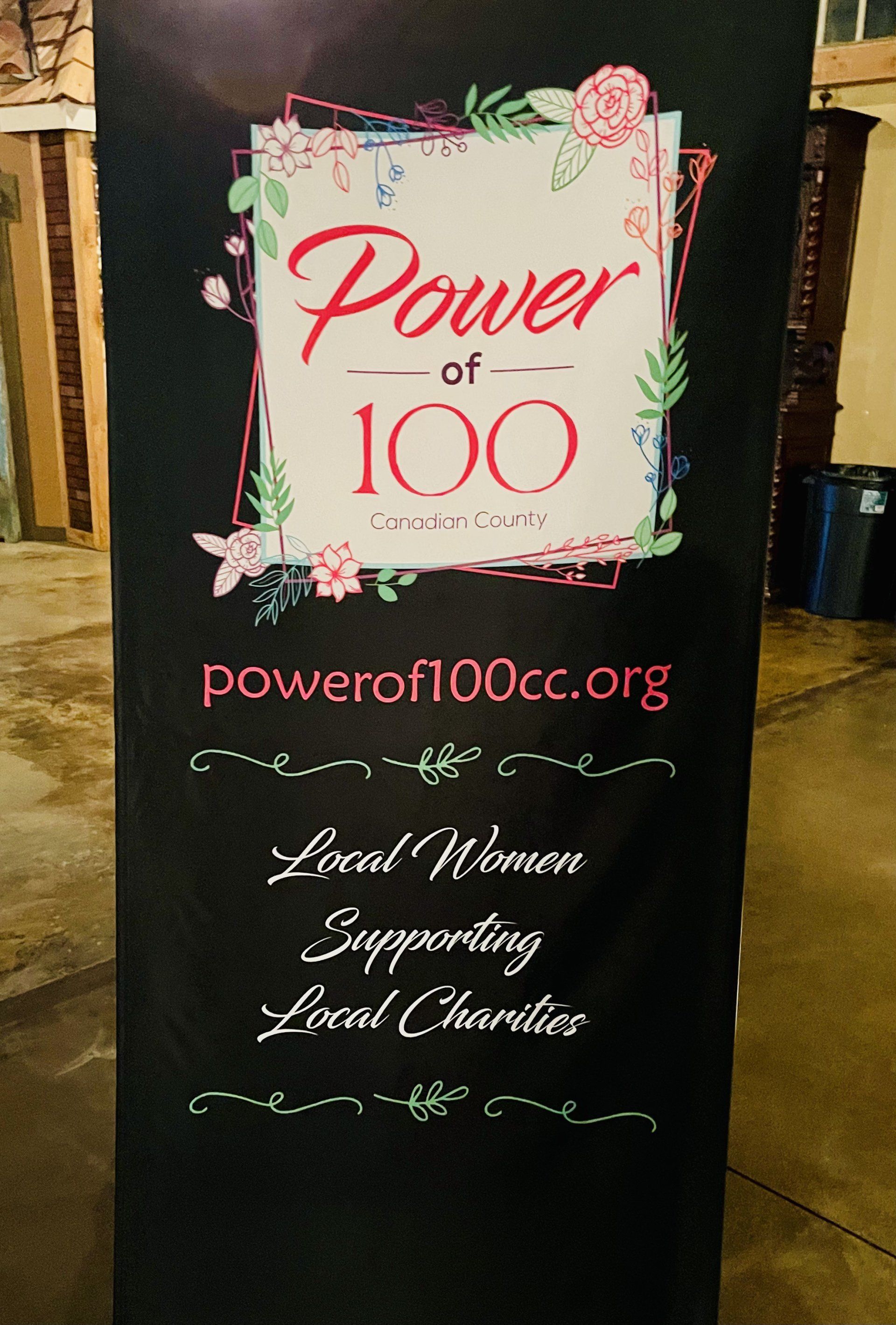 A sign that says power of 100 on it
