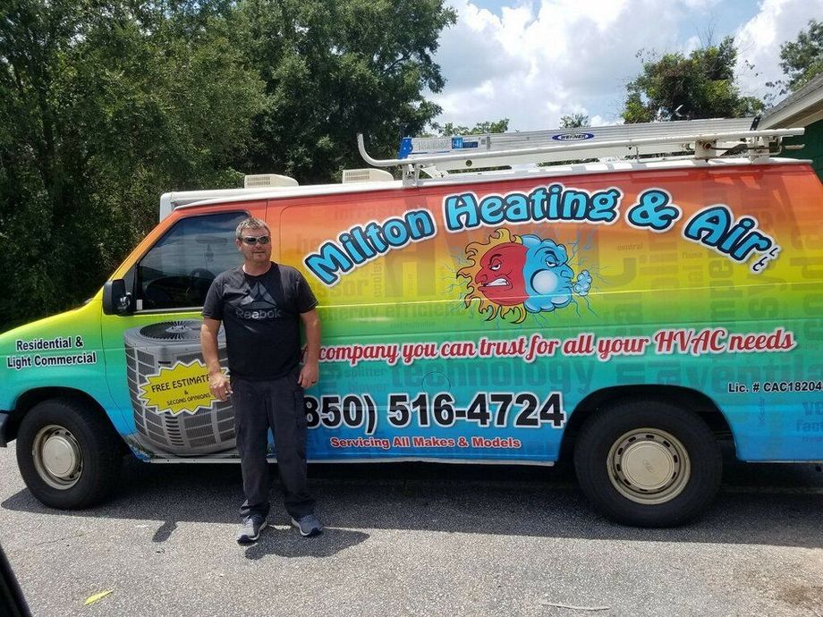 Milton Heating & Air service van with a man standing beside it outdoors