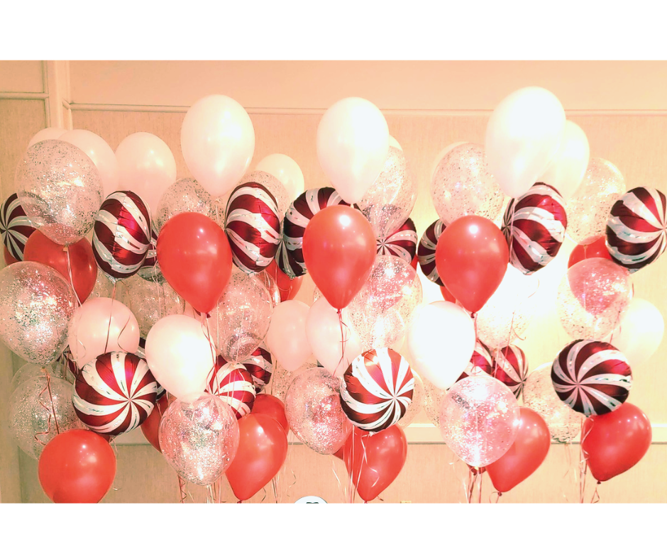 Helium balloon bouquets for a candy themed Christmas party