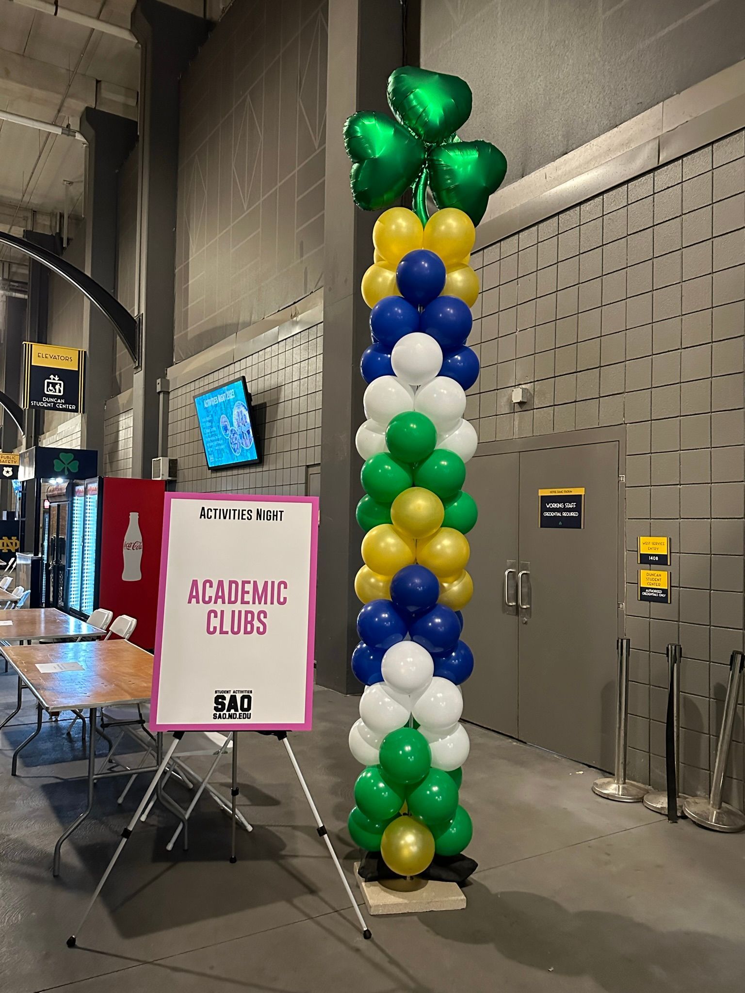 balloon column in gold blue green and white at Notre Dame