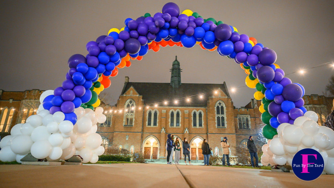 Rainbow balloon arch at Notre Dame