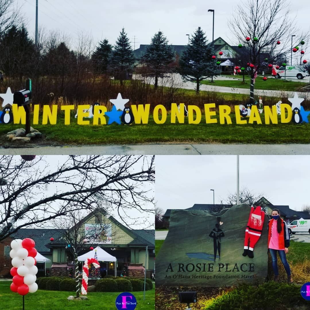 A sign that says winter wonderland on it.  yard Card