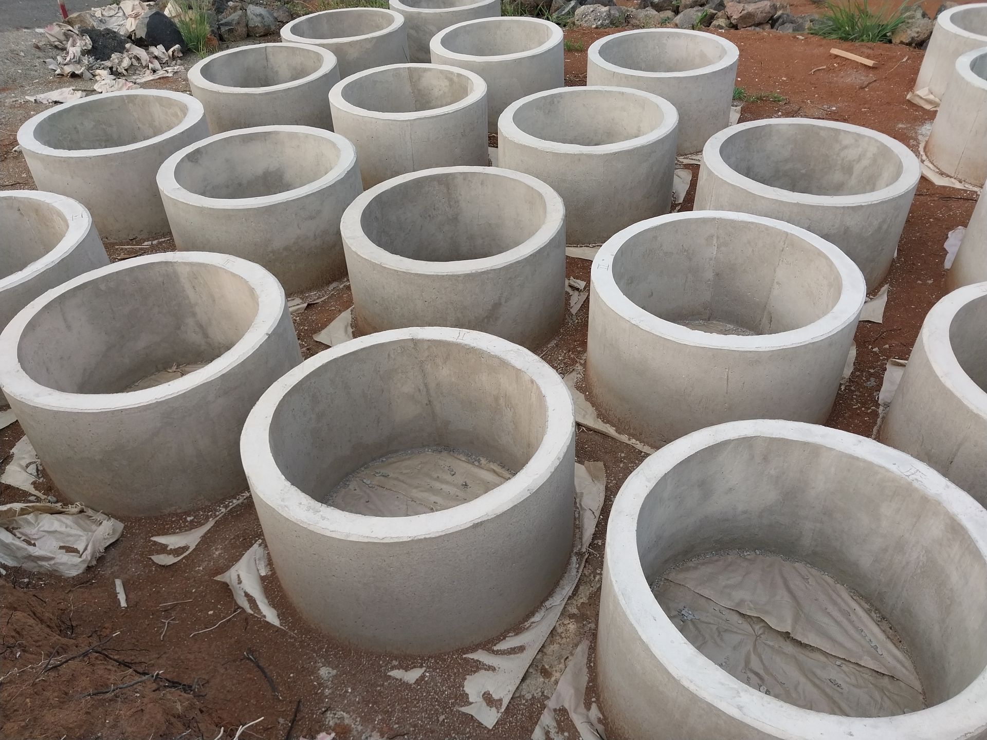 A bunch of concrete rings are stacked on top of each other