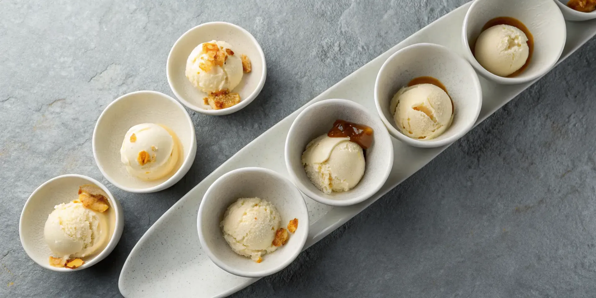Different alcoholic ice cream flavors in scoops.