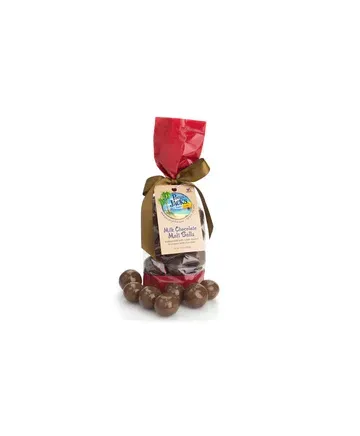 A bag of chocolate covered macadamia nuts on a white background.