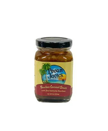 A jar of pecan jacks gourmet caramel sauce on a white background.