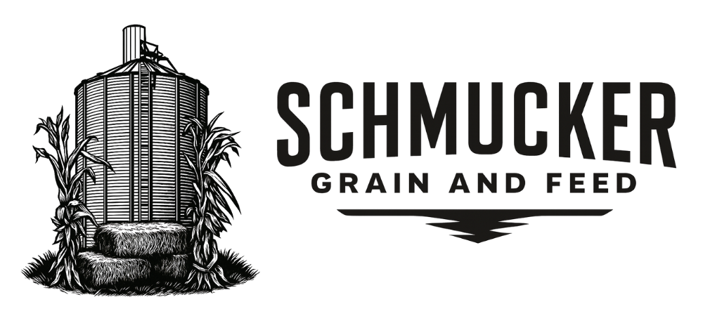 Logo for Schmucker Grain and Feed, featuring a silo with corn stalks and text.