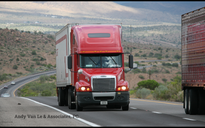 Large commercial truck driving on road