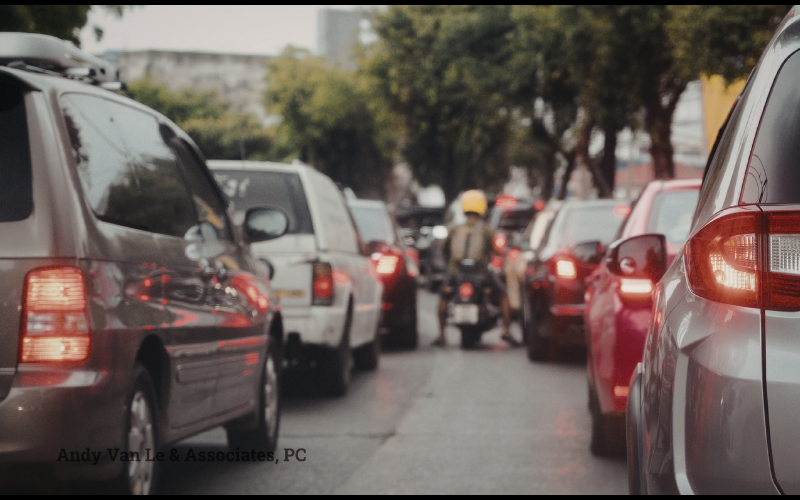 motorcycle driver in stopped traffic