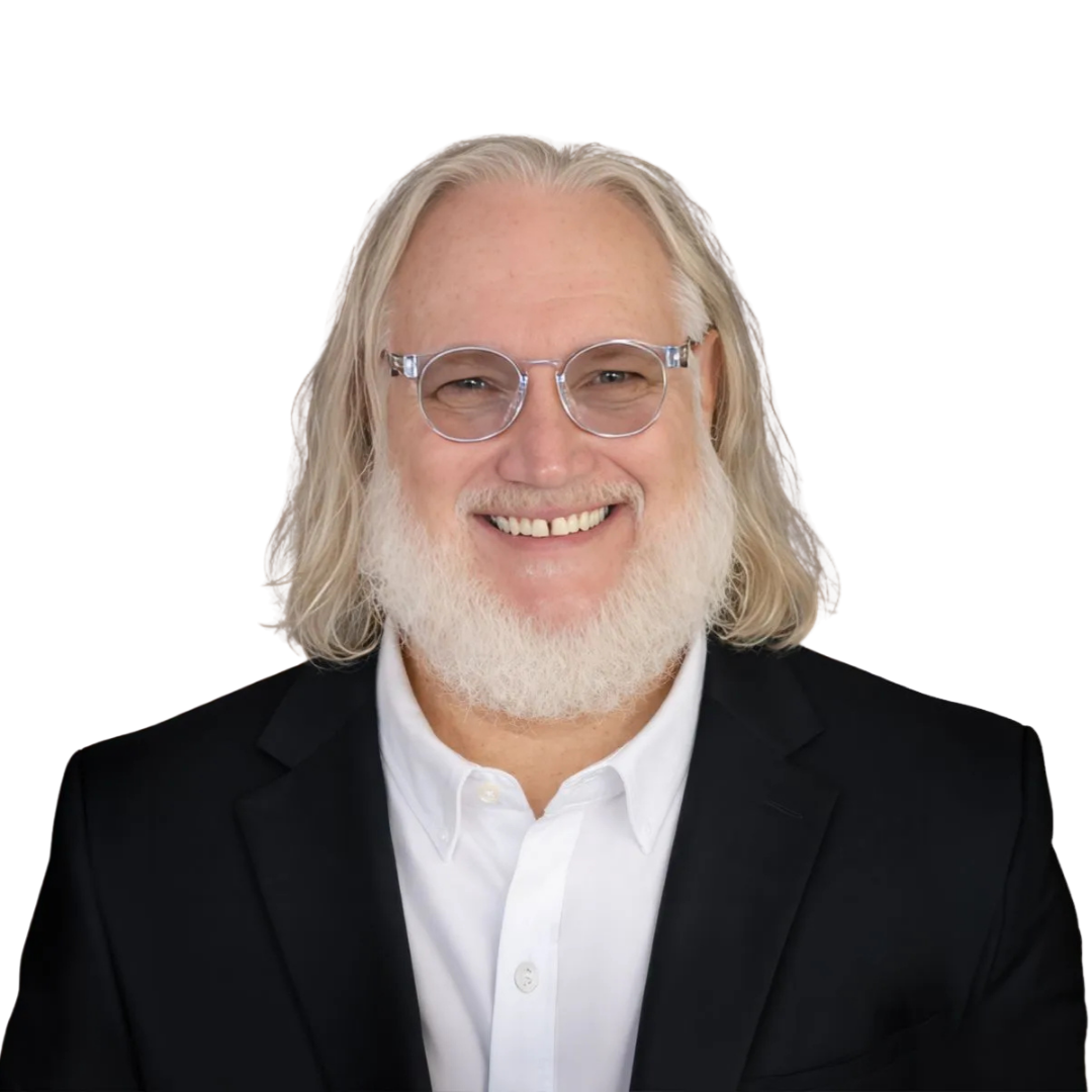 Chelsey White smiling with glasses and long dark hair against a white background