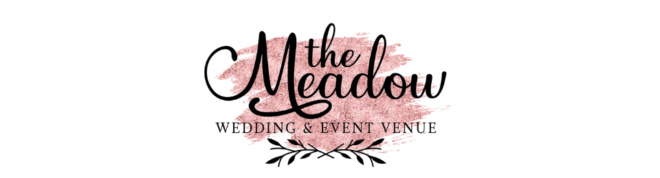 Logo for The Meadow Wedding & Event Venue in black script with pink floral accents on a white background