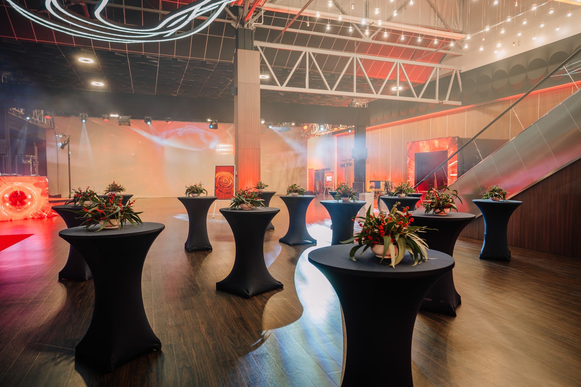 Event space with black cocktail tables