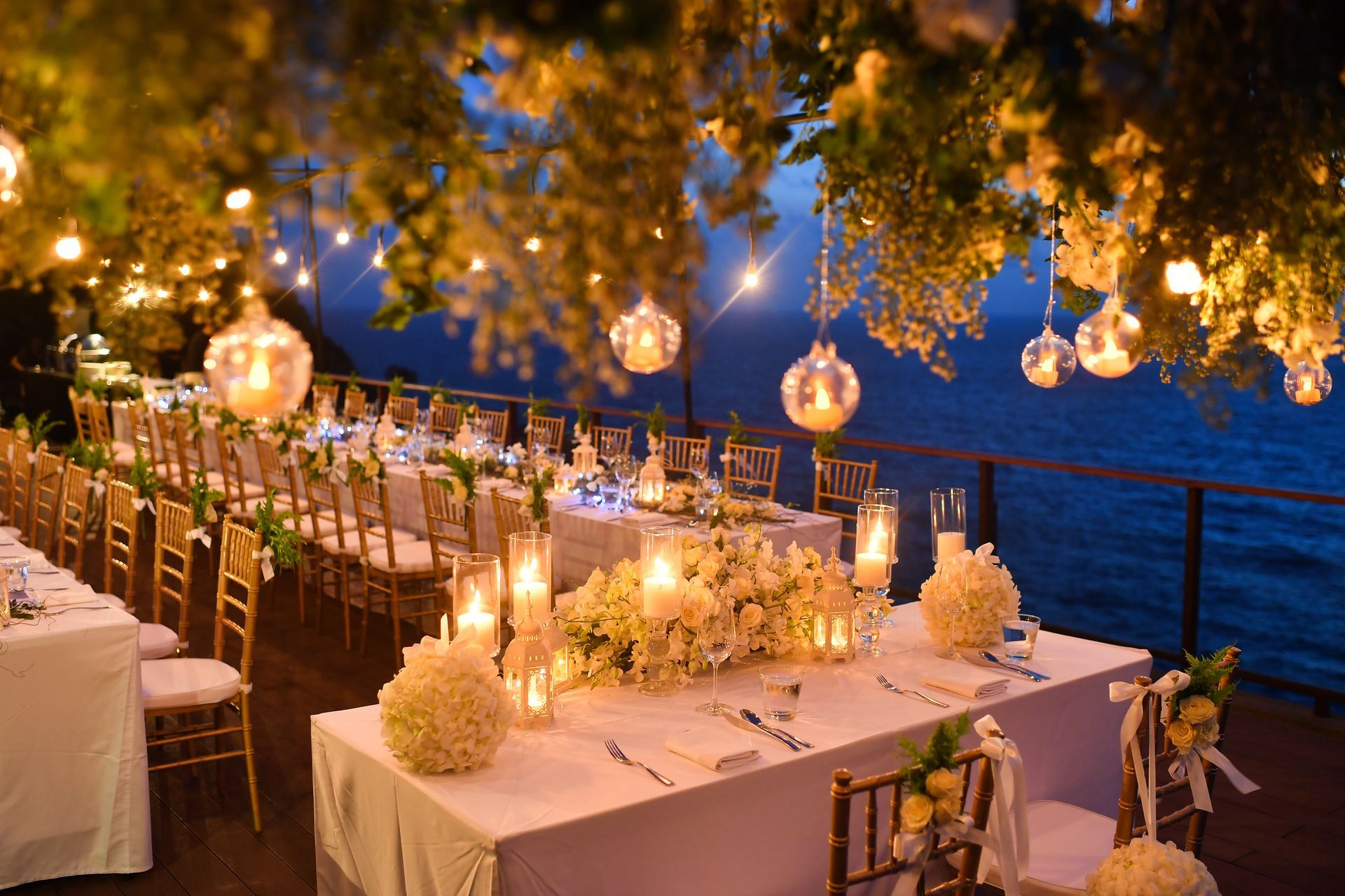 Wedding stage with pink and white floral decorations