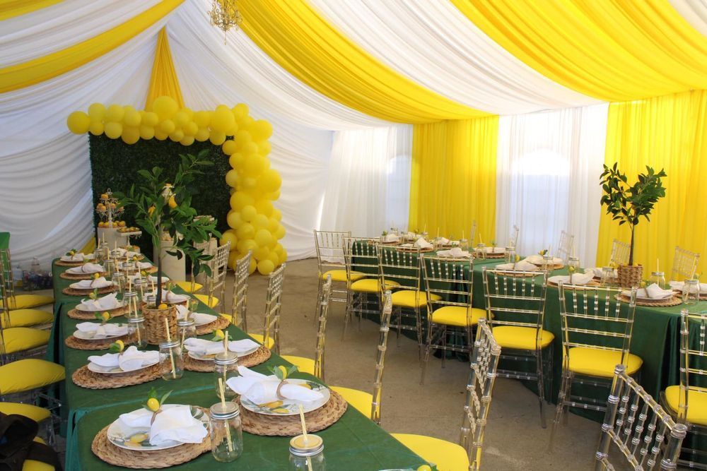 A yellow and white themed event space