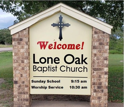 Sign for Lone Oak Baptist Church, with cross,