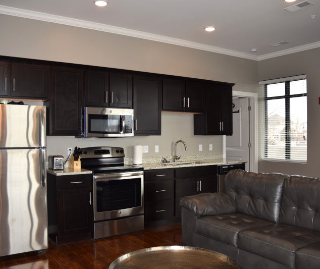 A Sleek Kitchen With Stainless Steel Appliances From The Lofts, Columbia, MO's #1 Apartment Complex.