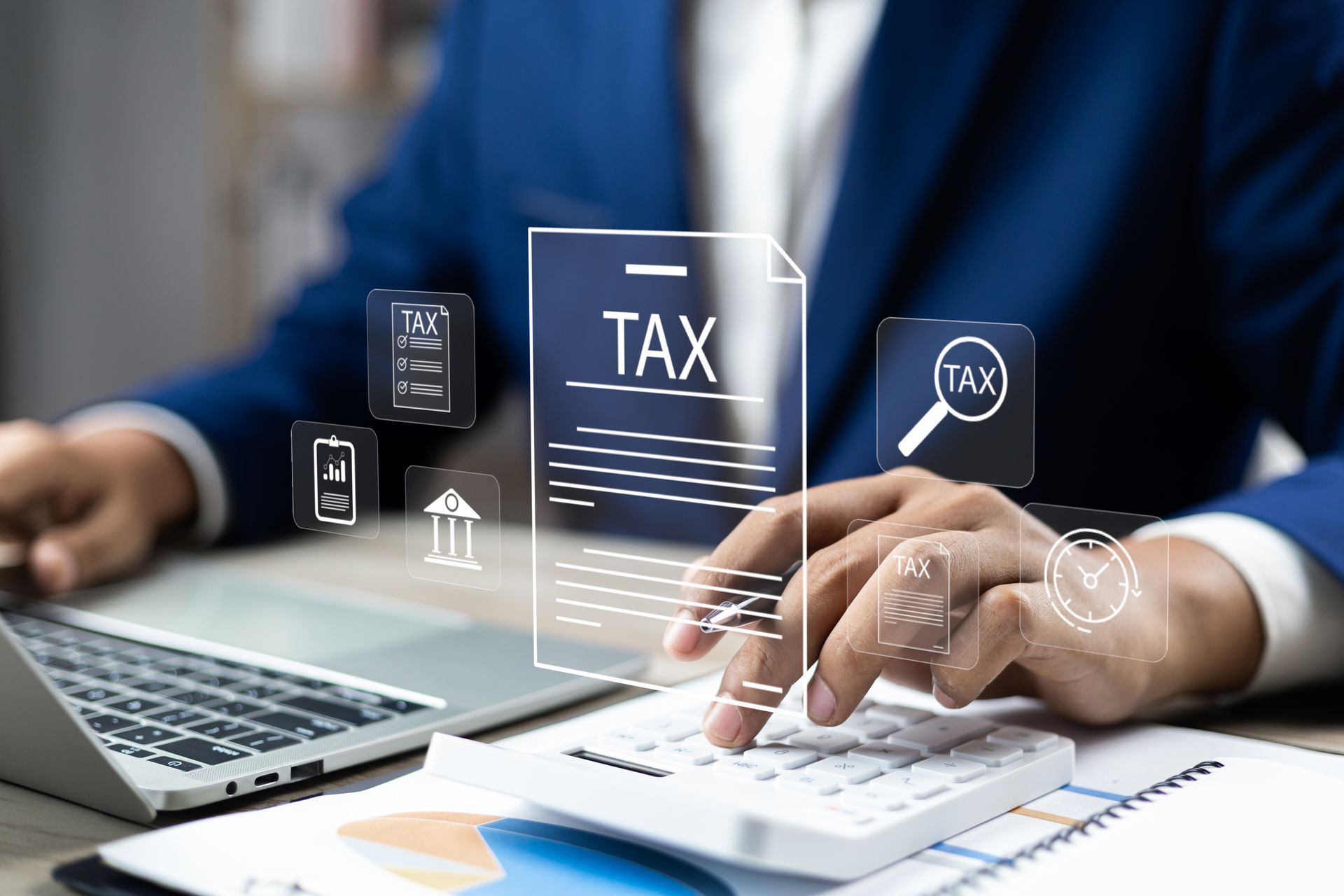 Person filling out tax form on laptop with calculator and document icons overlaying the scene Person filling out tax form on laptop with calculator and document icons overlaying the scene